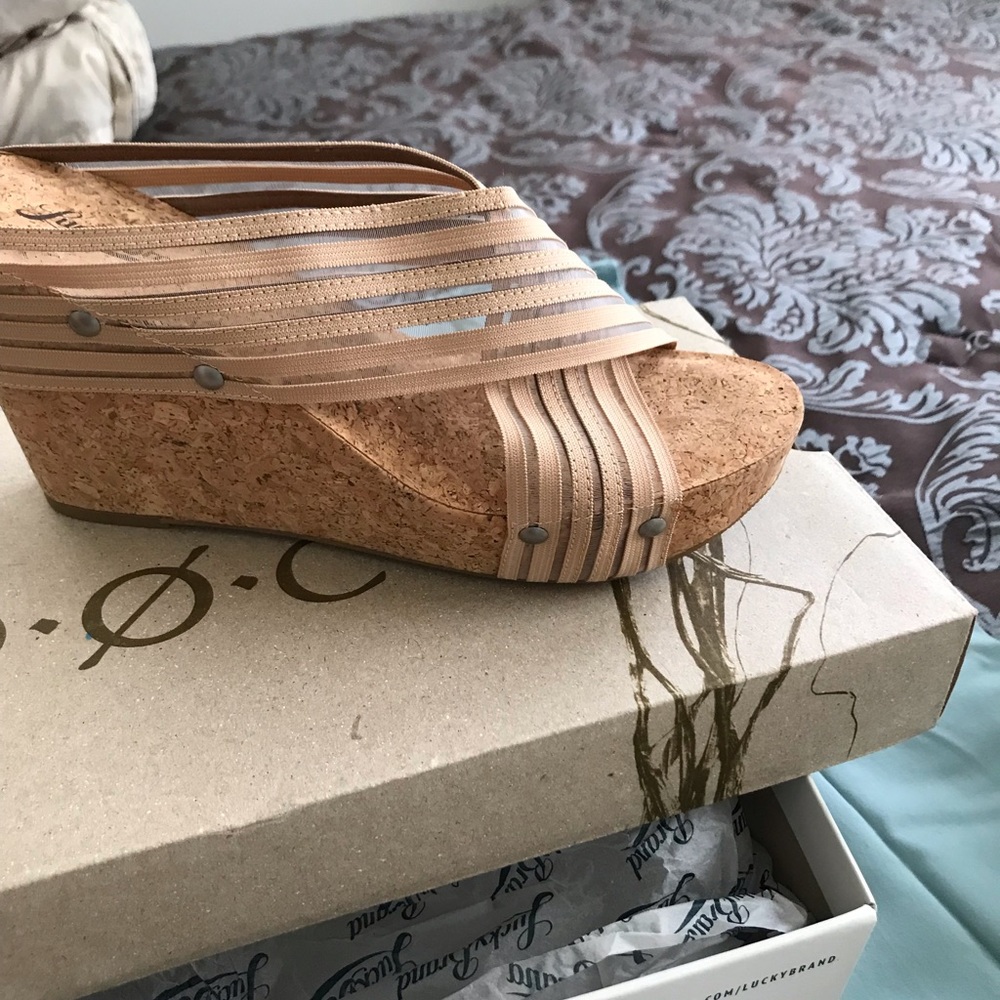 Size 8 platform sandals. NWOT.